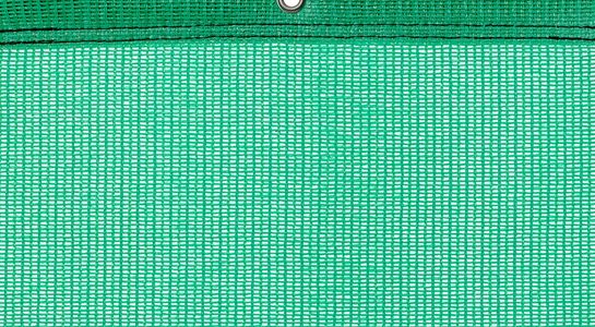 Detail picture of PE air permeable cover, 200 g, light green, with eyelet and border on top