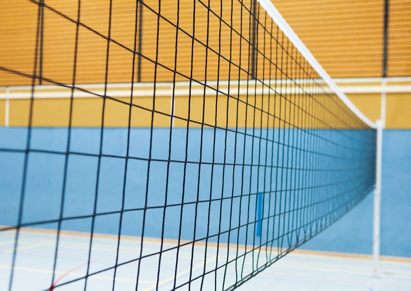 Long Volleyball net, black, with post in the back of the picture, detail picture