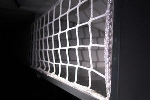 White net with elastic cord sewn to the edge for canvas, flame retardant, detail picture