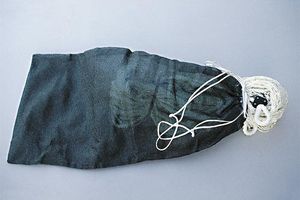 Storage sack for safety netting