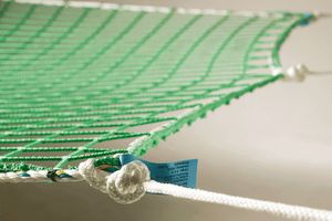 safety net with suspension ropes in green