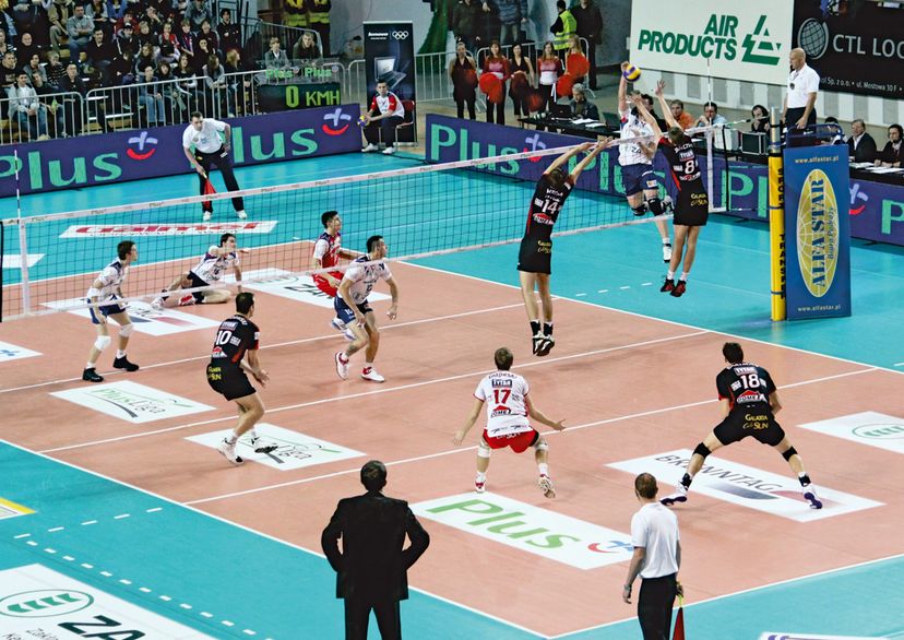 Volleyball tournament with men players inside a sports hall